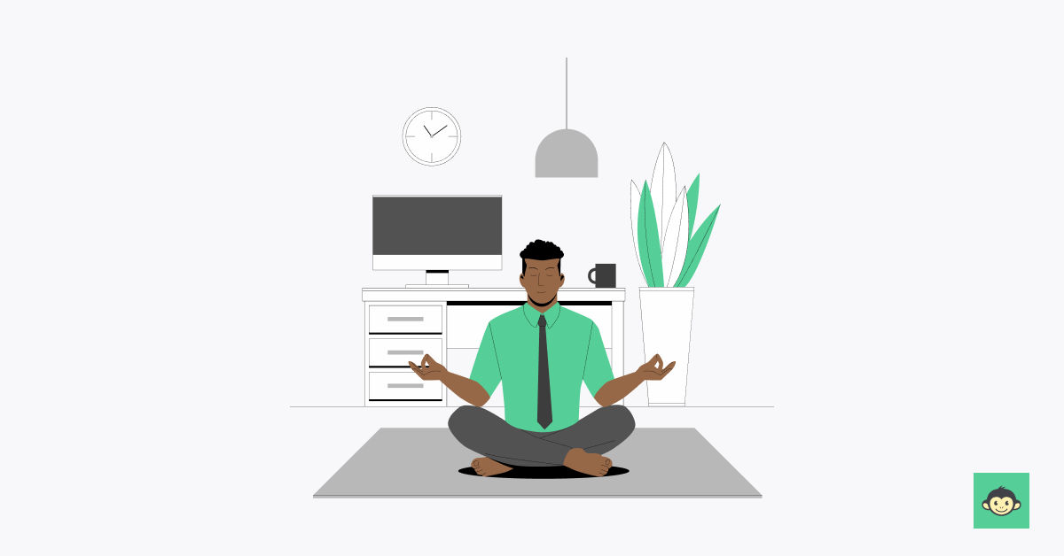 An employee is meditating while working remote