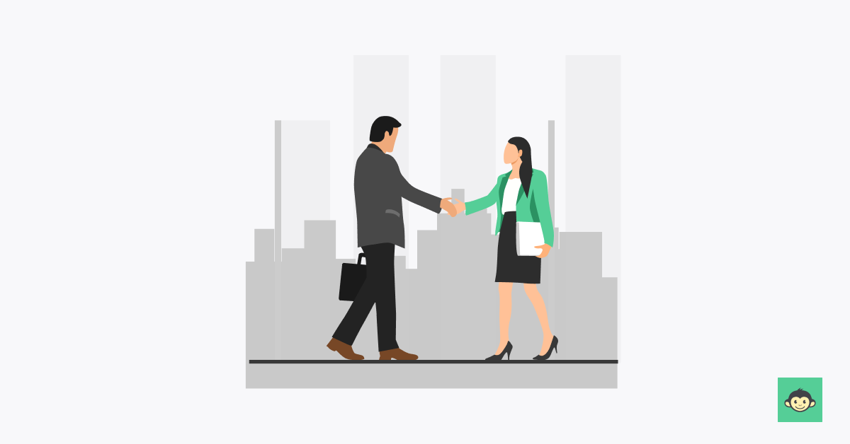 Employer welcoming a new hire with a handshake 
