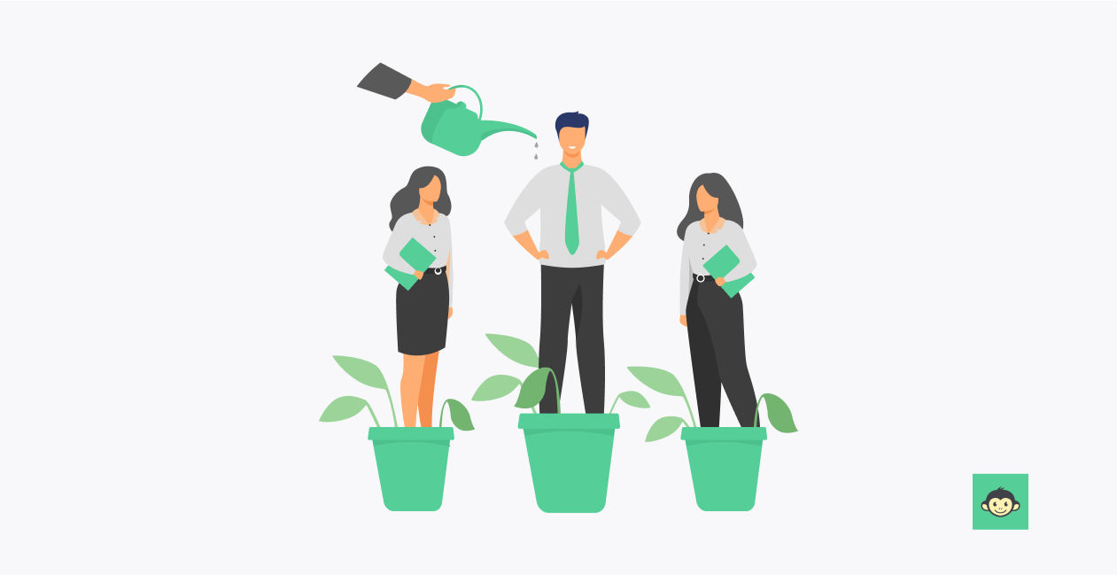 A leader helping employees grow by watering them