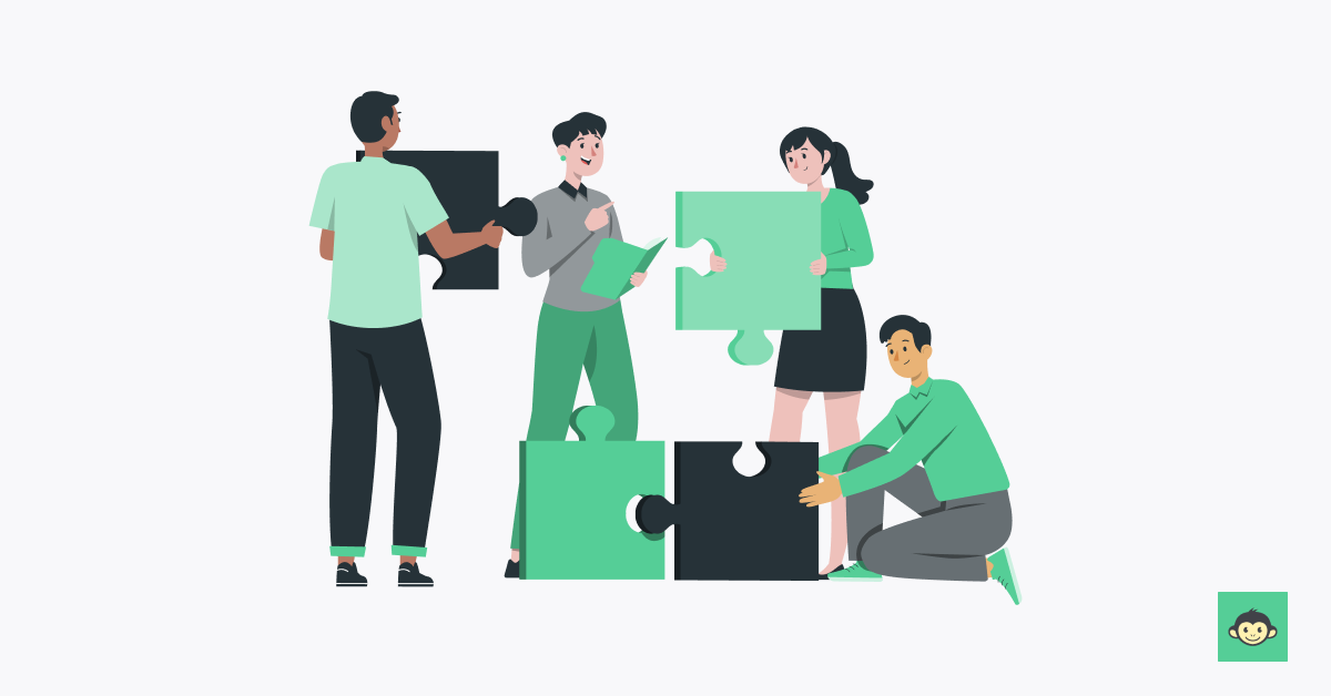 Employees are working on connecting a puzzle in the workplace