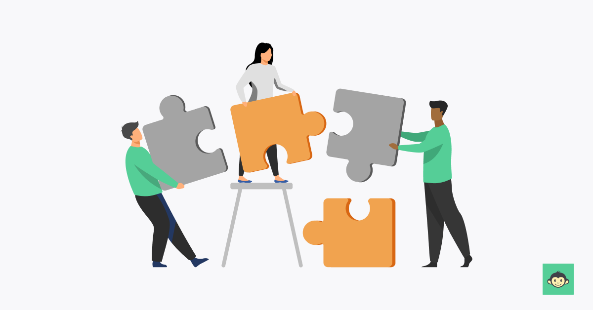 Employees are connecting puzzles in the workplace