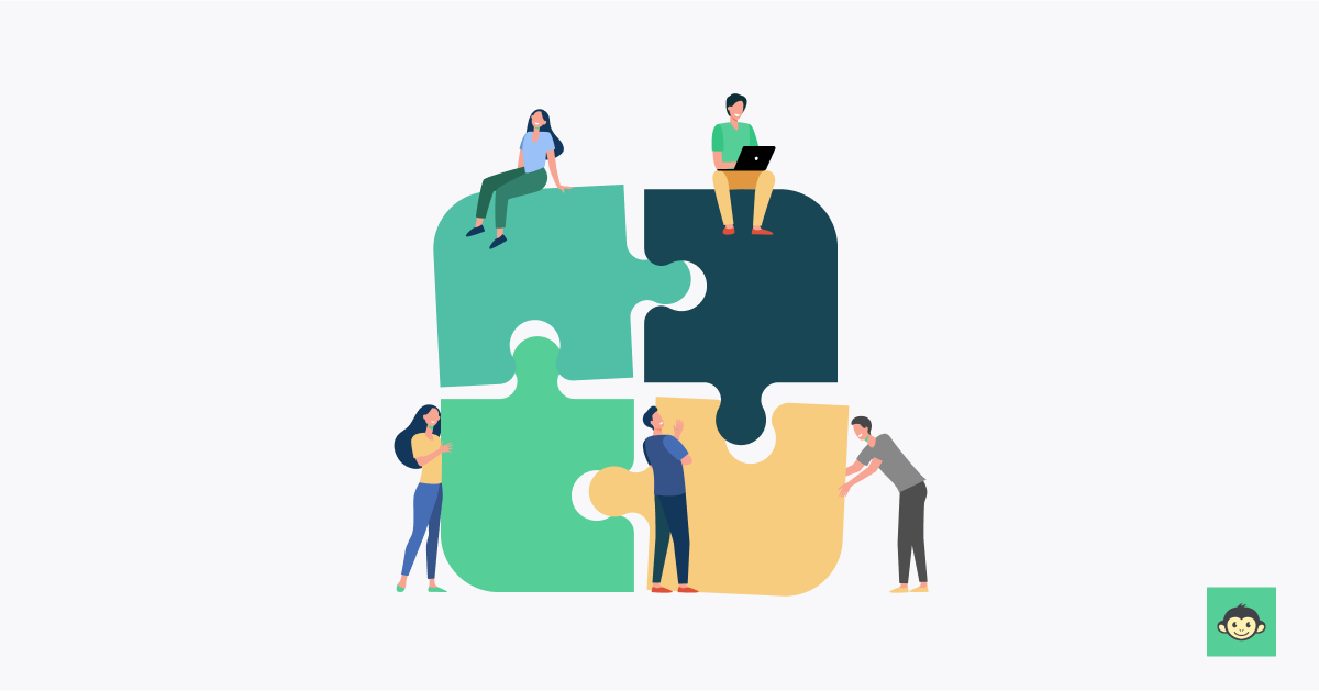 Employees are connecting puzzles in the workplace