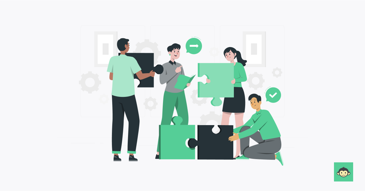 Employees connecting puzzles in the workplace