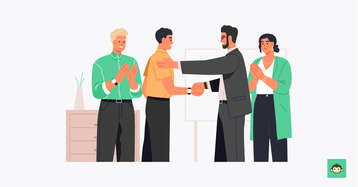 Employer and employees welcoming new employee 