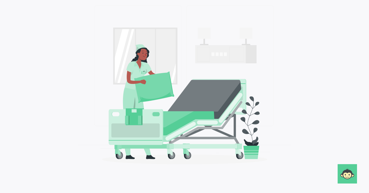 A nurse getting the hospital bed ready