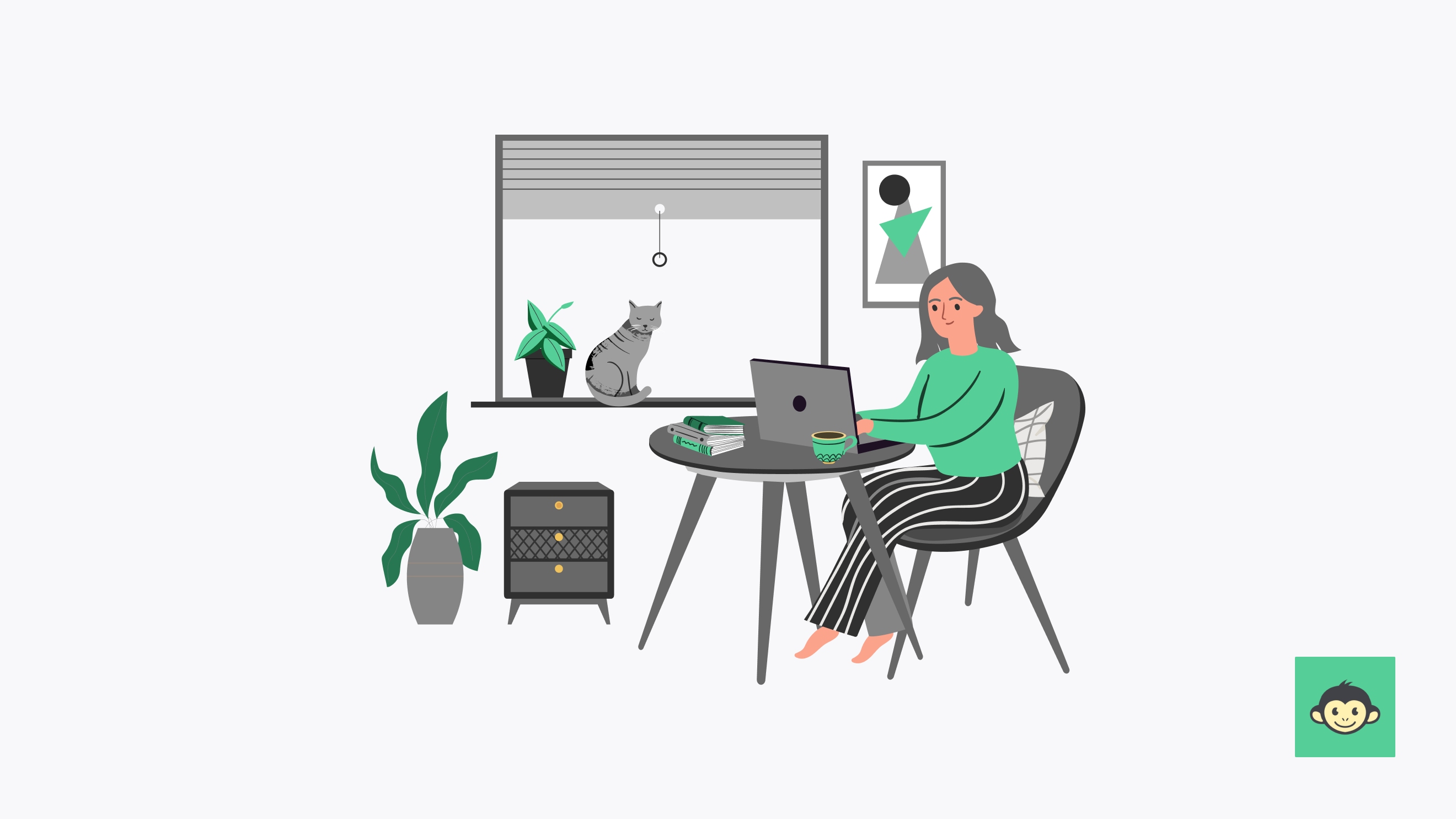 An employee working from home with a cat in the backgroud