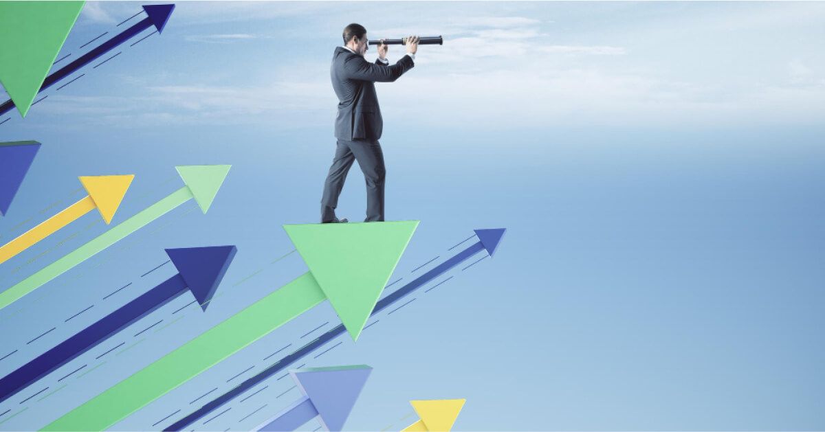 Employee standing on upward trend and looking with binocular