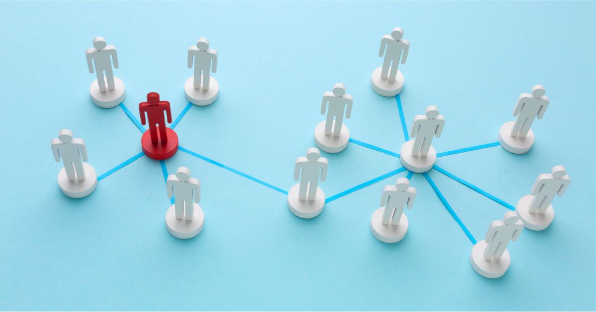 A group of interconnected white pawns in blue background