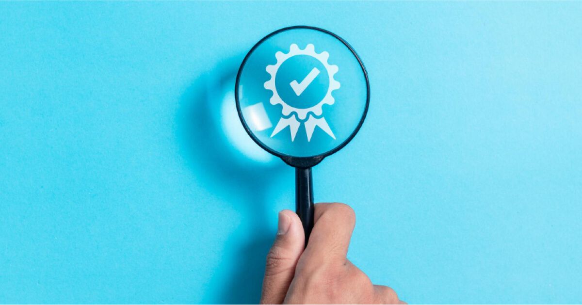 A magnifier in blue background