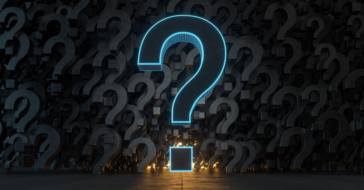 A giant question in neon blue