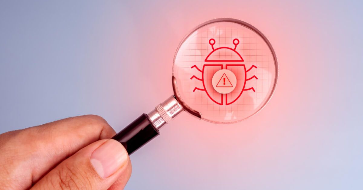 A magnifier glass pointed over a software bug visual