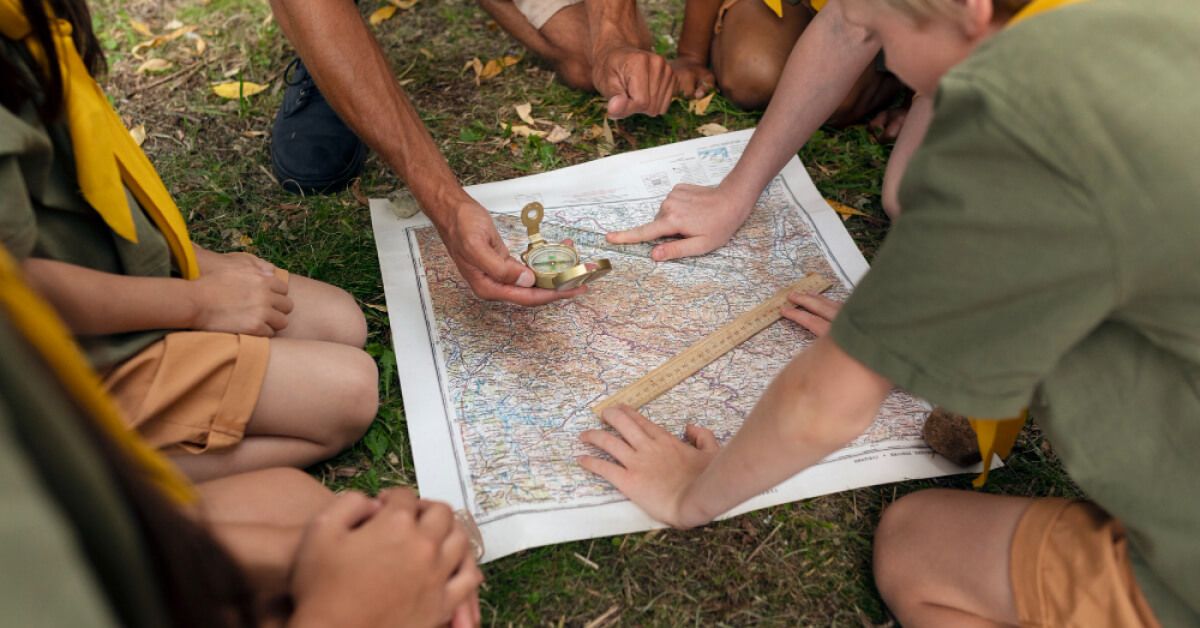 A team of people working around a map