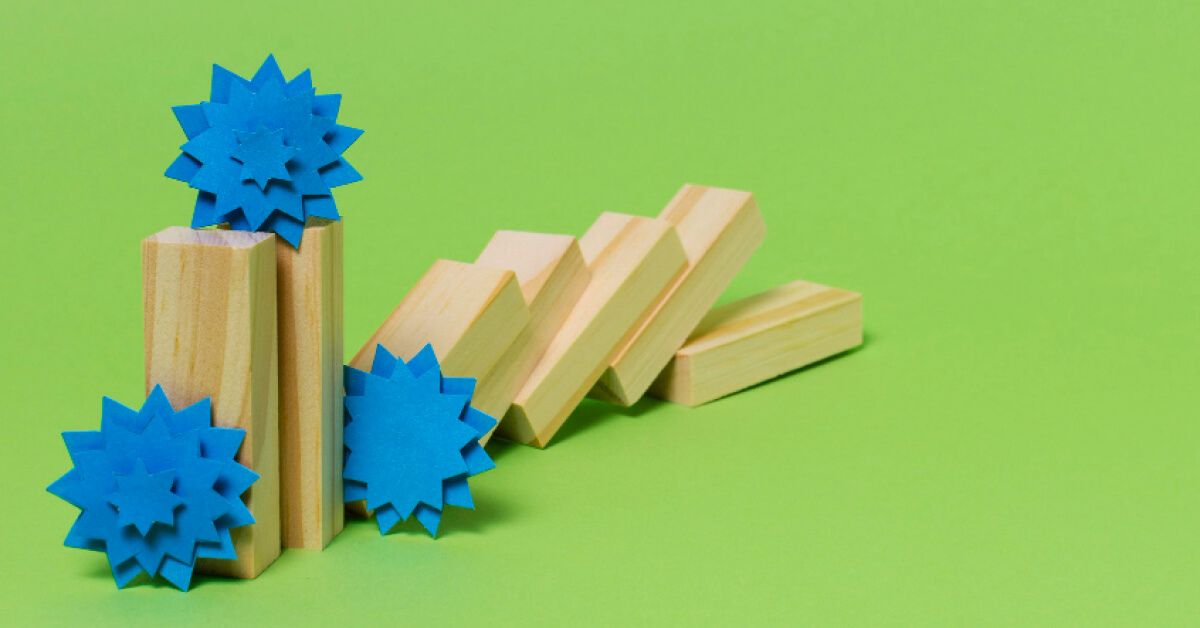 Blue paper origami with wooden blocks