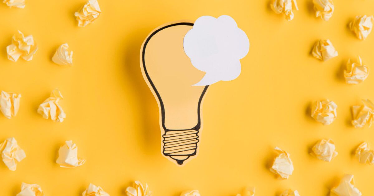 Speech text next to a light bulb