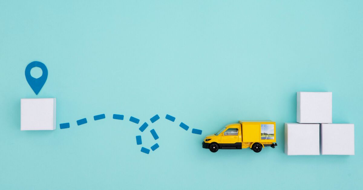 Miniature truck being trailed between two sets of white blocks