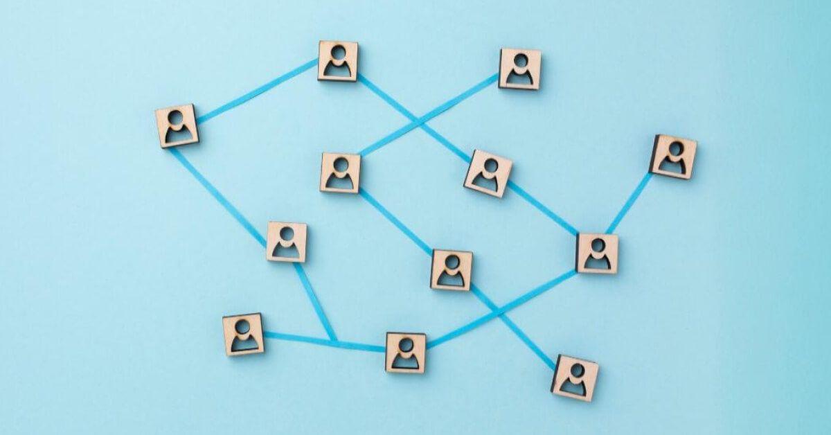 A network of connected wooden employee chips