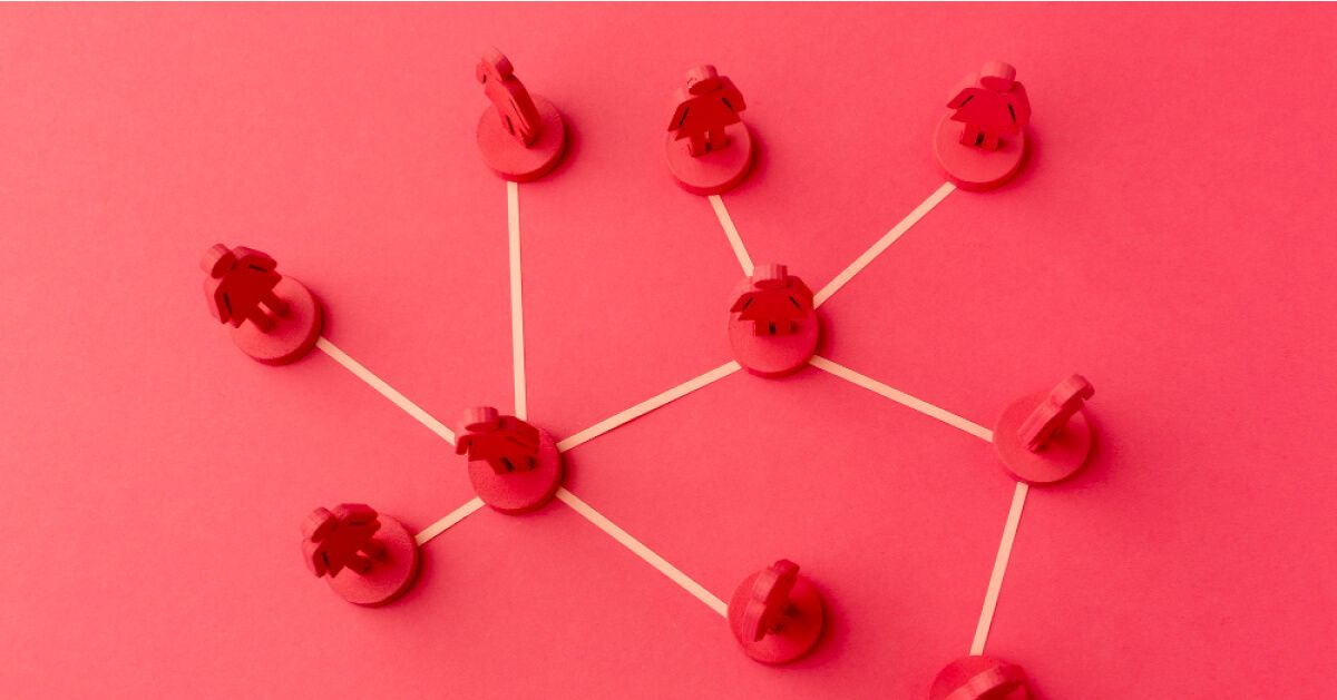 Set of interconnected red figurines