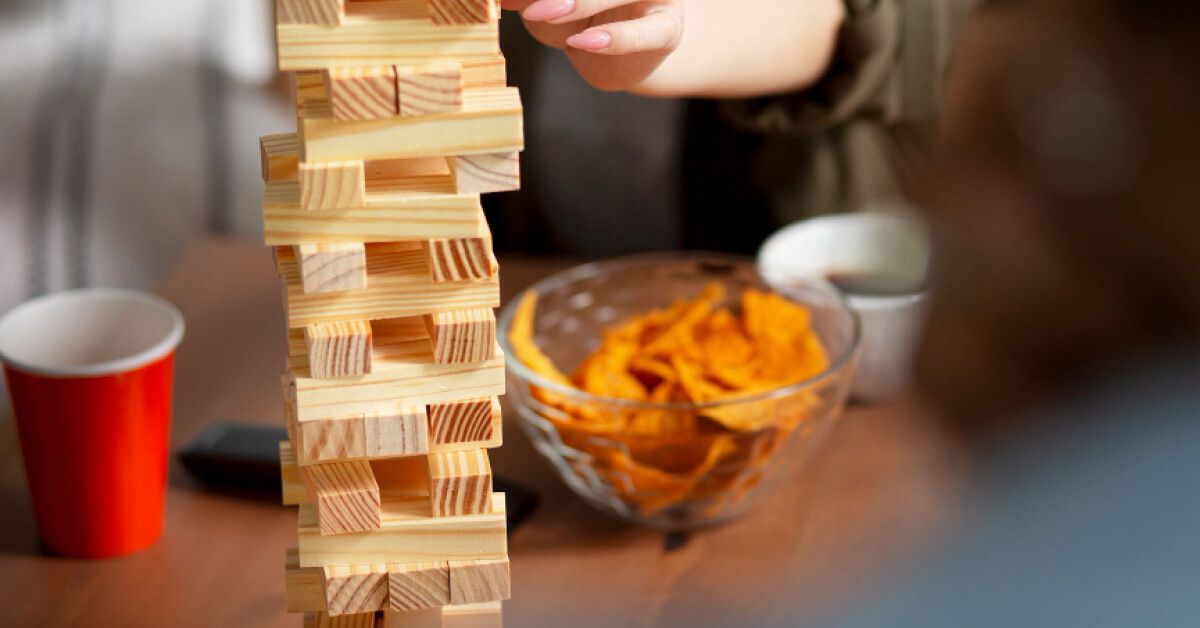 A tower of interlocked wooden blocks