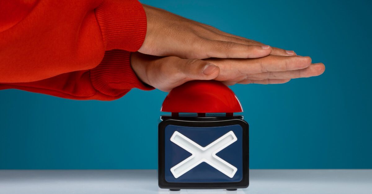 A man pressing a button