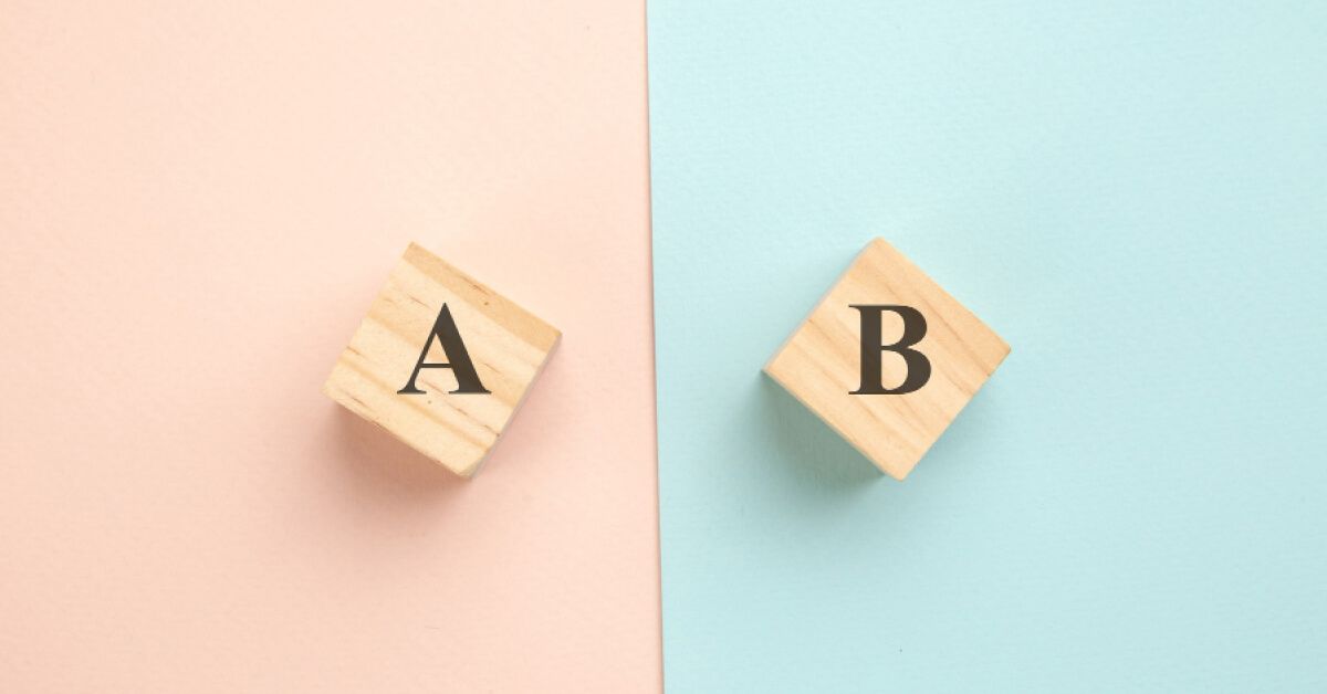 Two wooden blocks with A and B on them