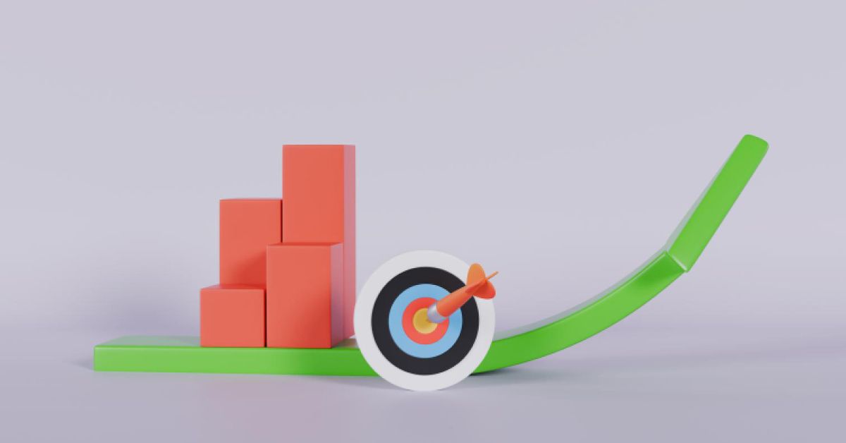 A dartboard alongside some rectangular blocks and a green plane