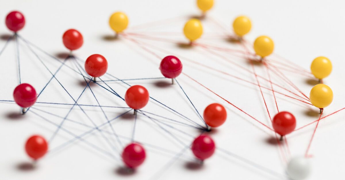 Red and yellow bobby pins with interconnected threads