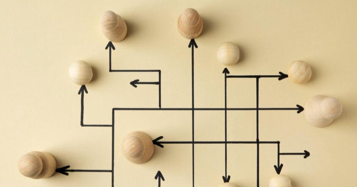 Wooden pawns with interconnecting black arrows