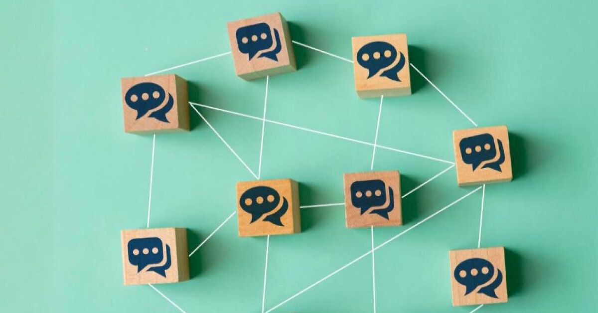 Communication symbol on wooden blocks connected to each other 