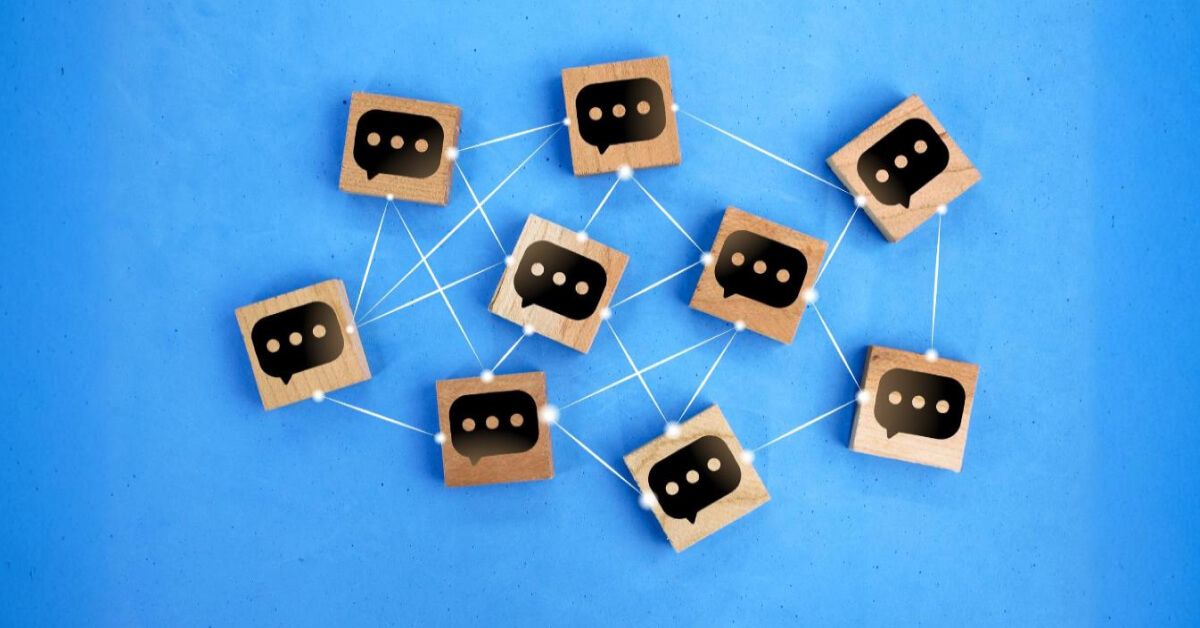 Network of wooden blocks with message graphics on them