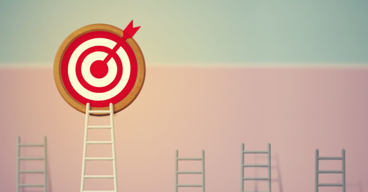 Big ladder leads to a dart board 