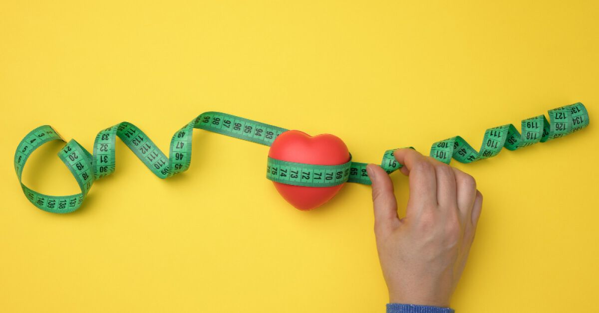 Measuring tape in yellow background