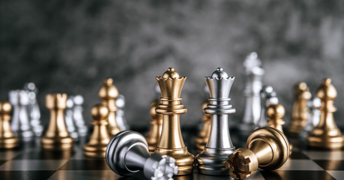 Silver and gold chess pieces