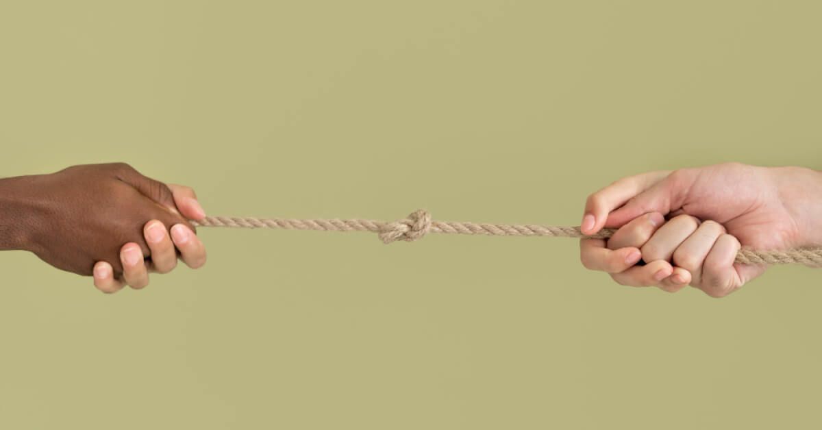 tug of war between two people