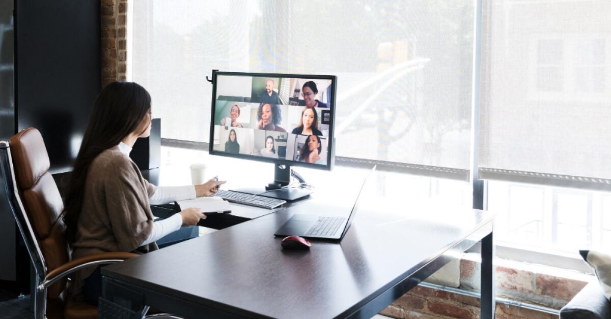 Person attending a virtual meeting in a remote setting