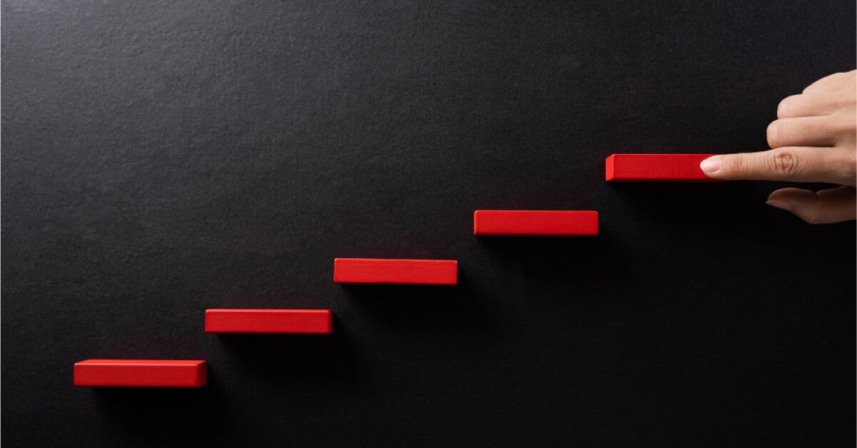 Red wooden blocks in a step sequence