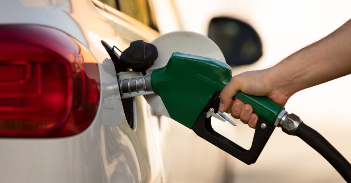 A man filling petrol