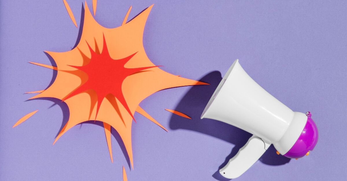 Top view of megaphone with paper shape