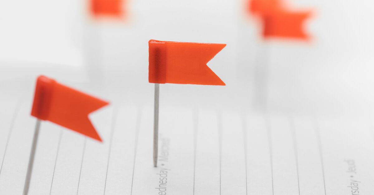 Miniature red flags