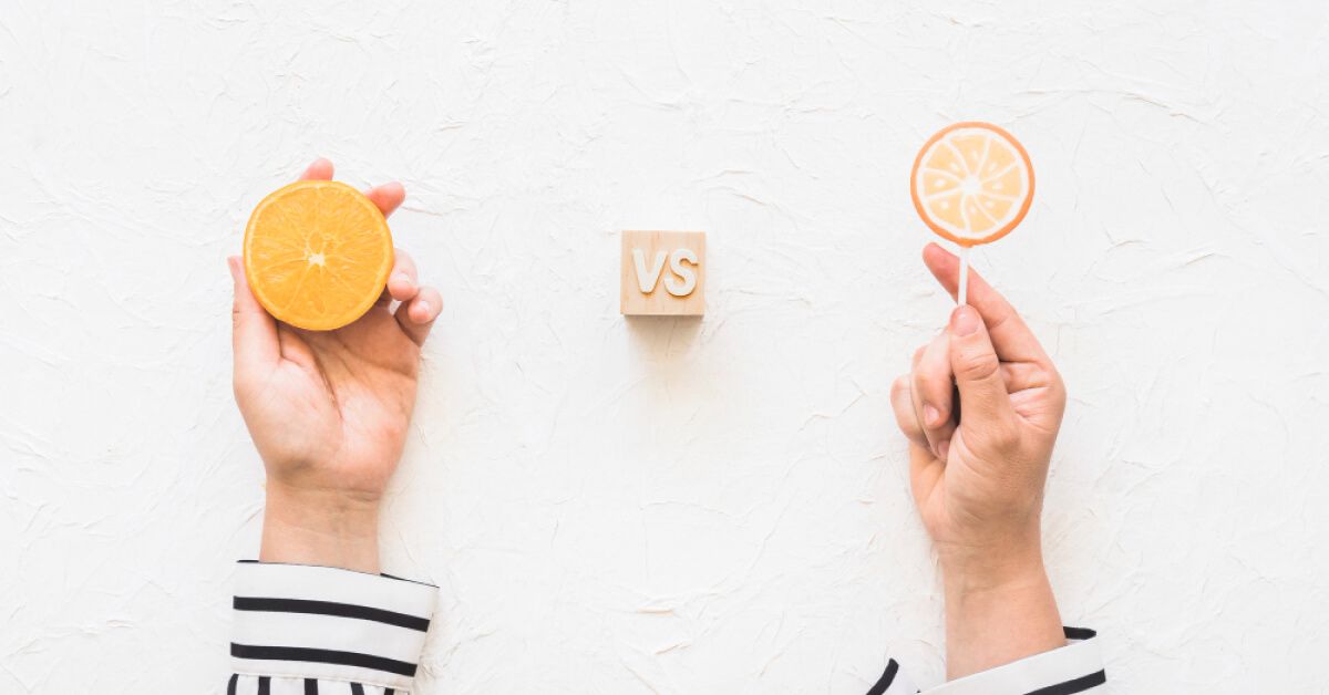 An orange and a lollipop