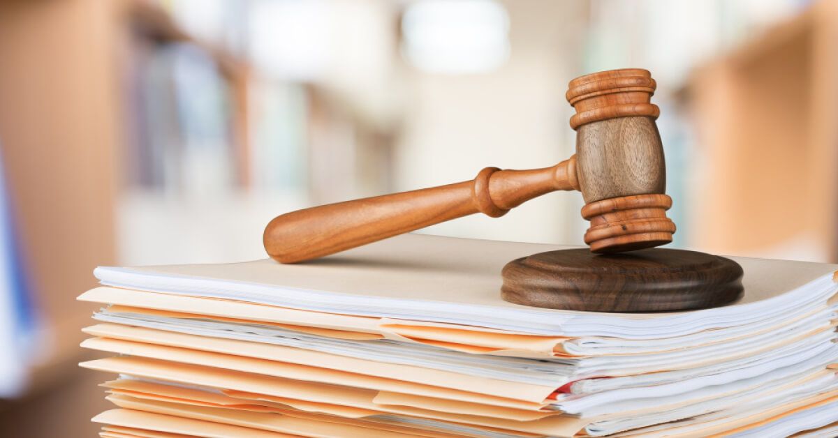 Mallet placed over a set of documents