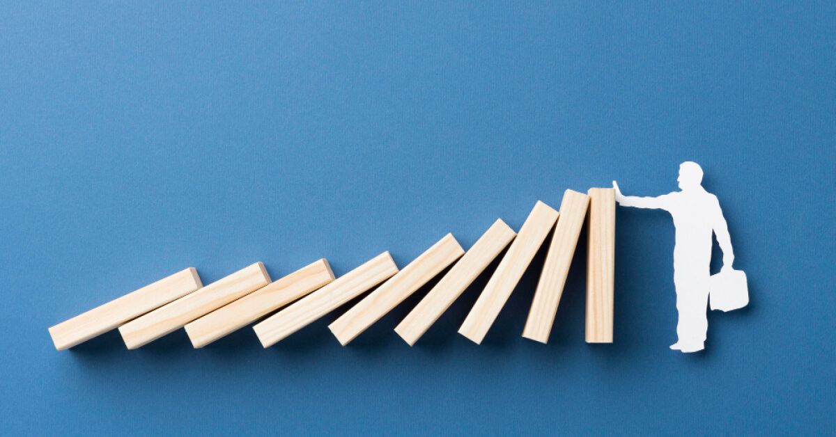 A man stopping jenga