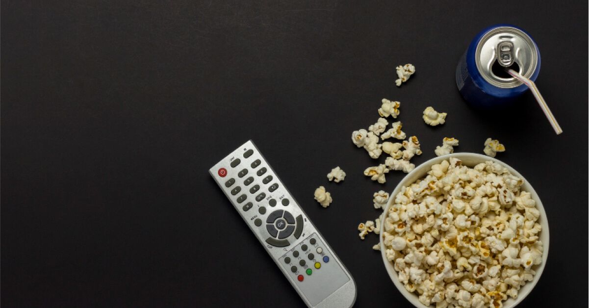 A remote and popcorn