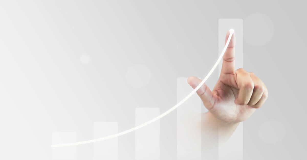 Person interacting with an upward moving graph