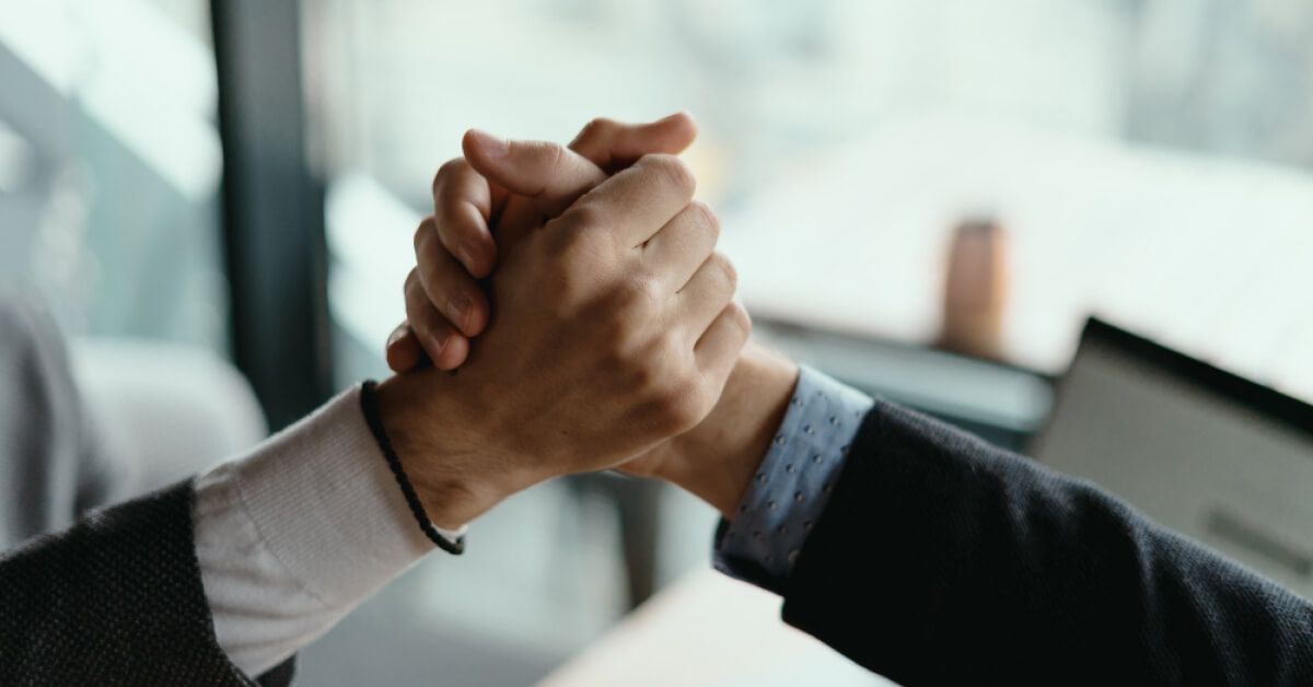 Employees greeting each other