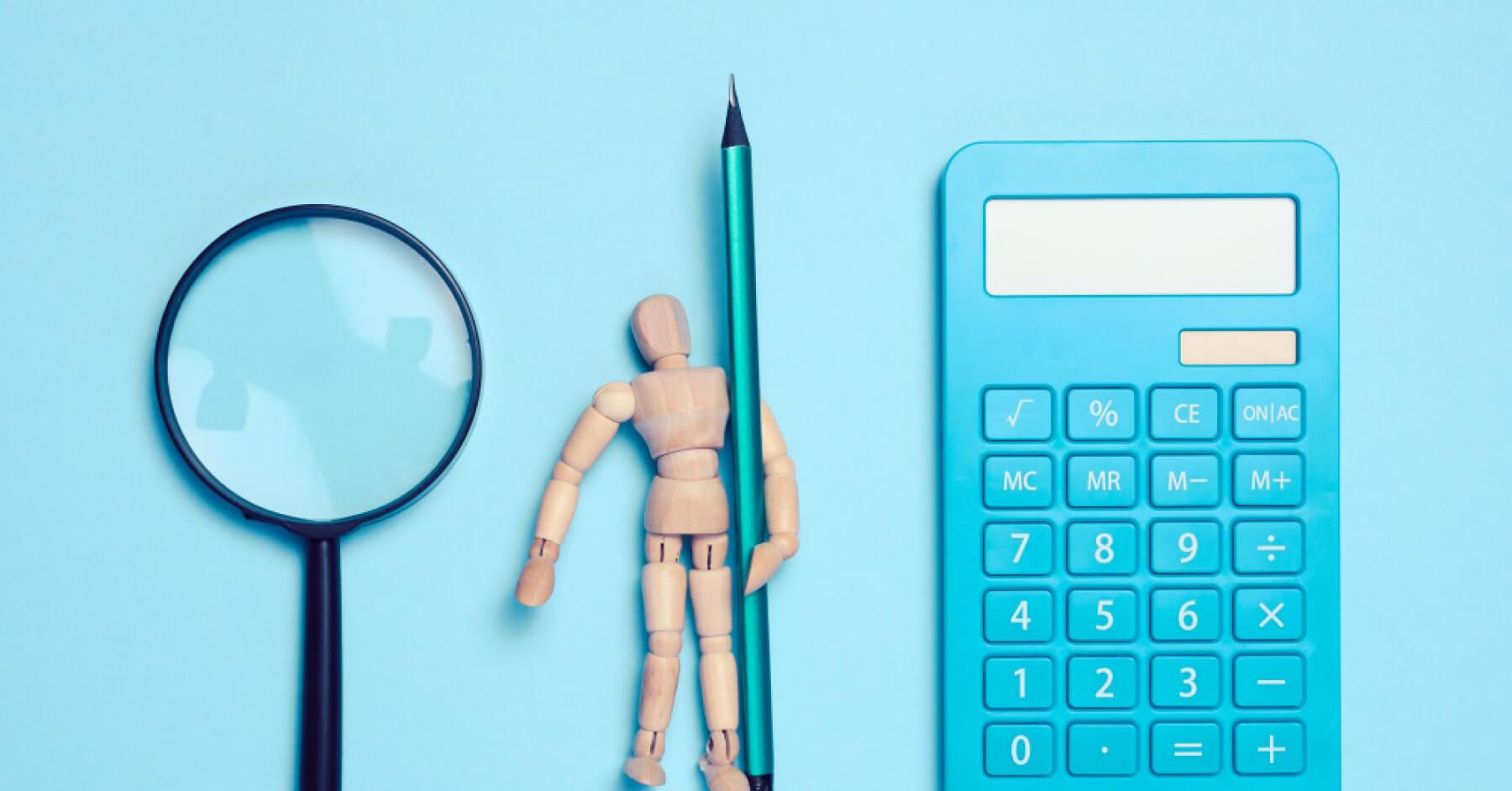 Magnifying glass, woodman holding a pencil and a blue calculator