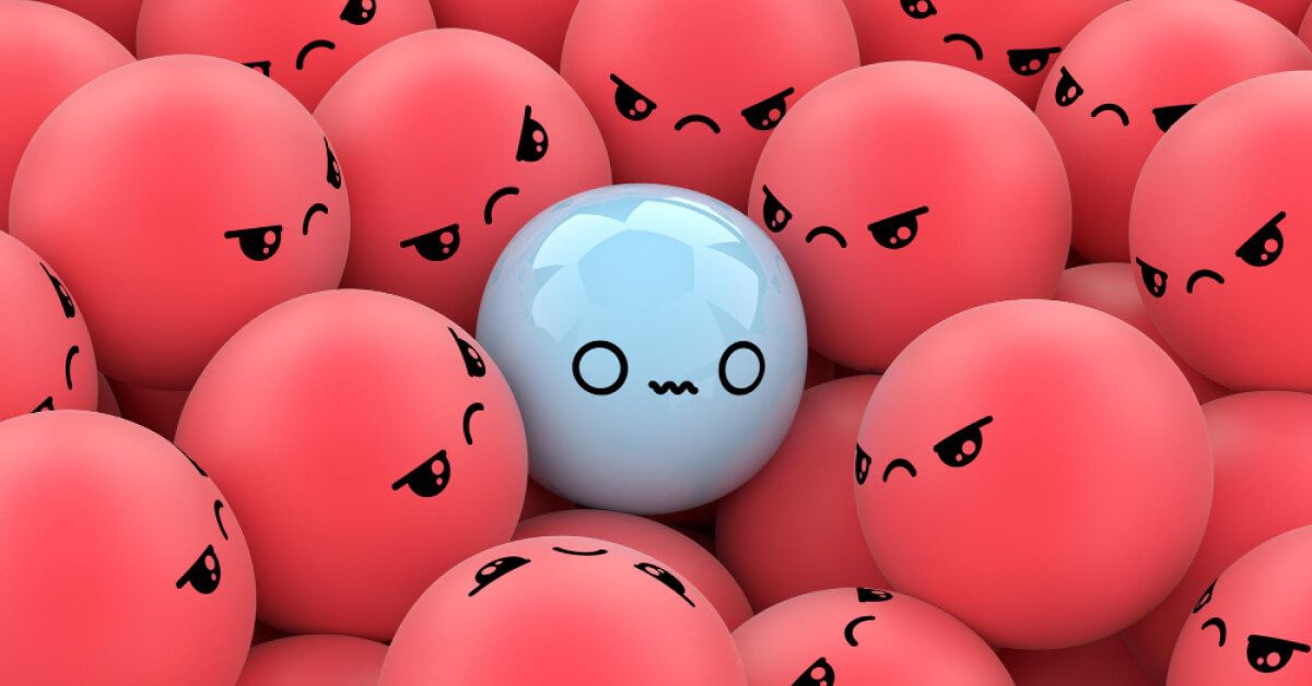 A blue ball being threatened by red balls all around