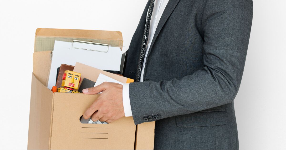 Employee packing his things in a box to leave