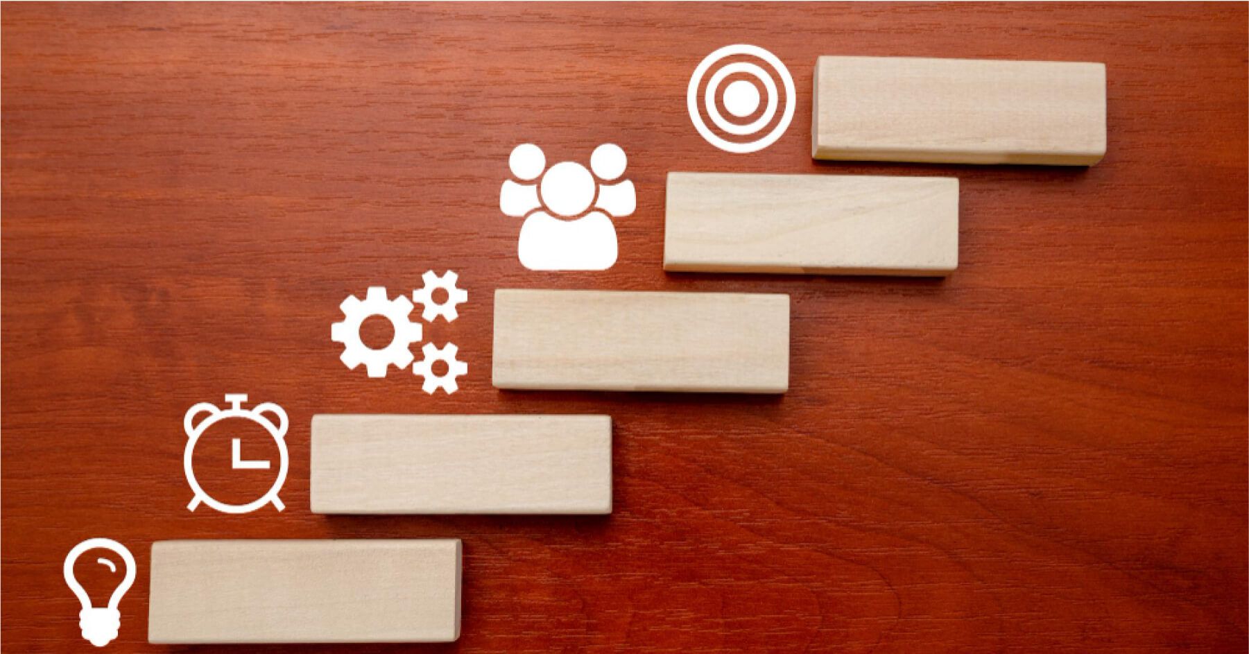 Vector visuals next to wooden blocks arranged like steps