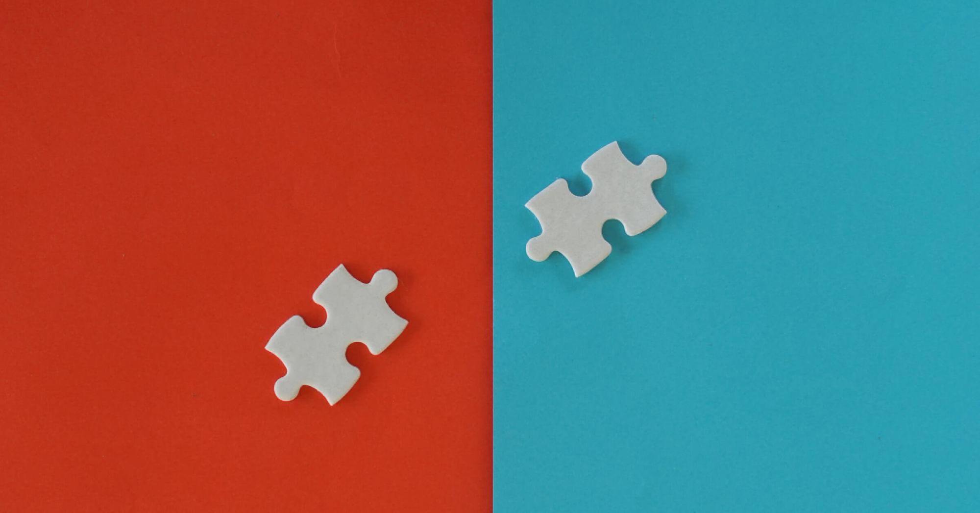 Puzzle pieces against red and blue backdrops