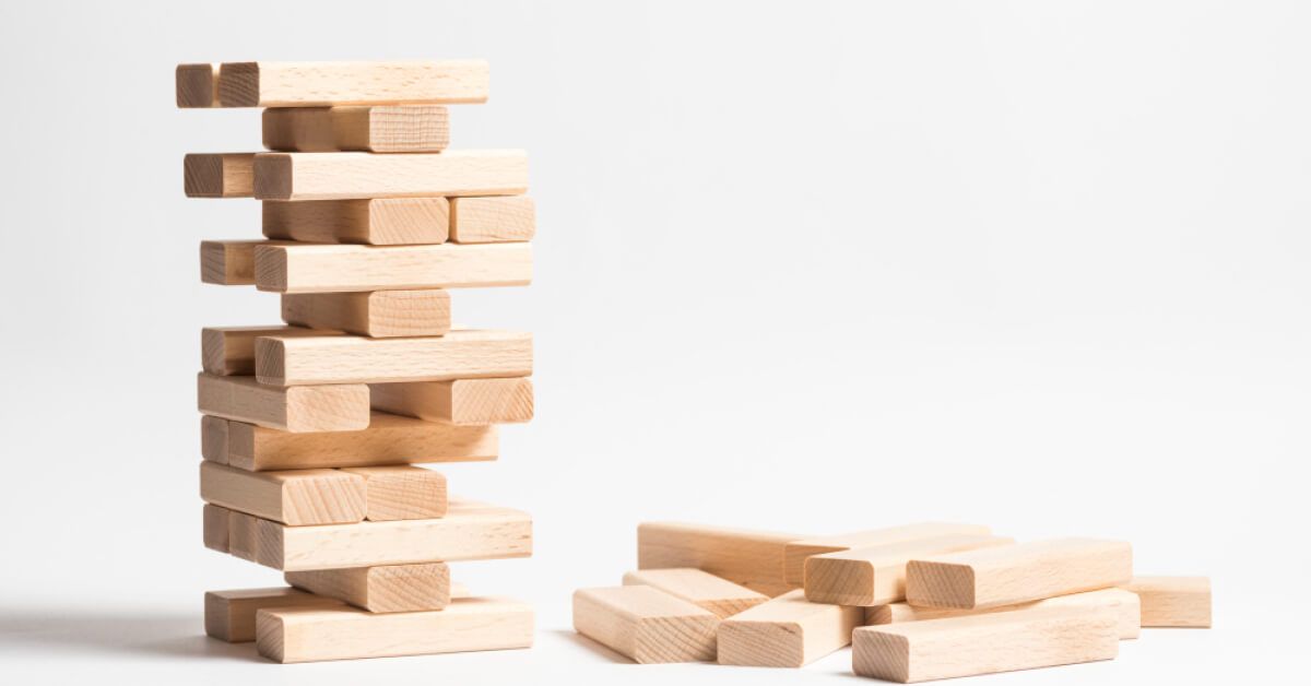 Tower of interconnected wooden blocks